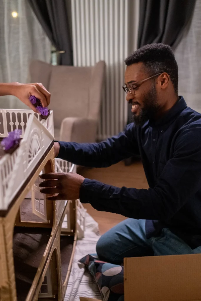 Man assembling a piece of furniture at home
