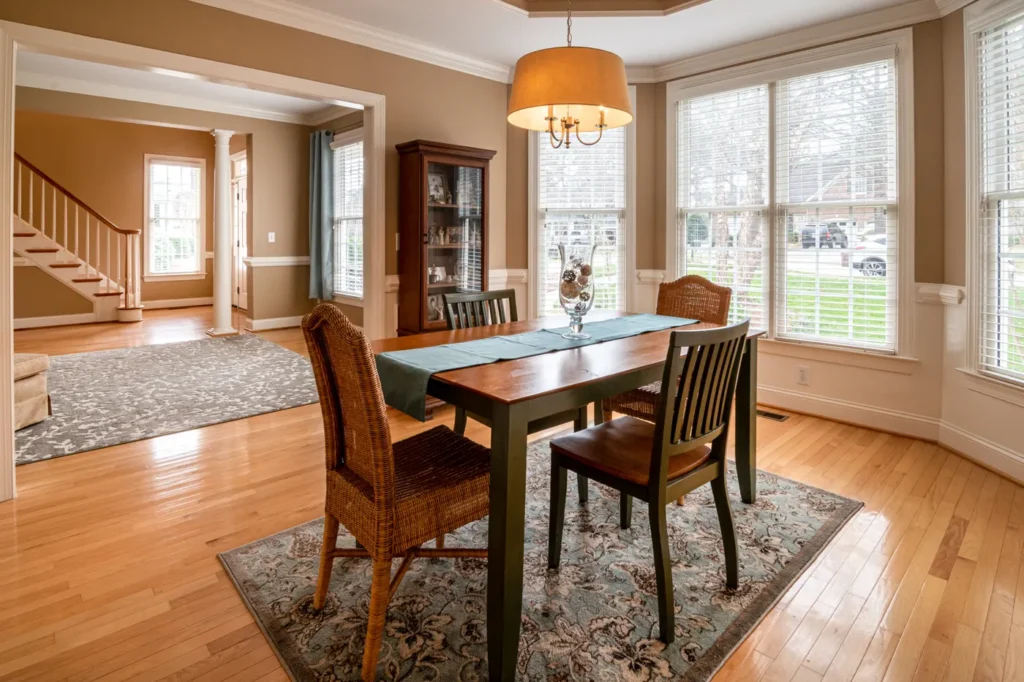 Wooden dining table and chairs in a dining room